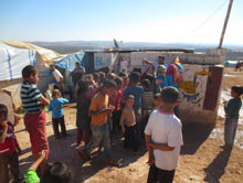 Hand washing demonstration in one of the camps on World Hand Washing Day.